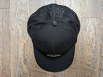 Snapback: Curved Bill, Pinched Front, Laser Perforated Performance Trucker (Black)